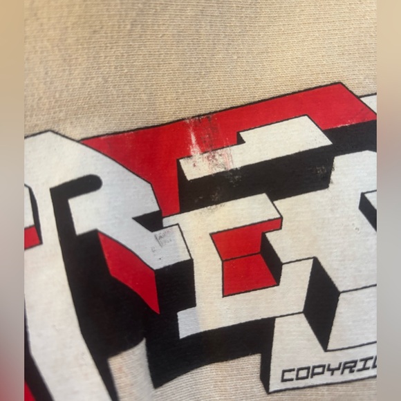 Supreme Cream Hoodie with Red Tag